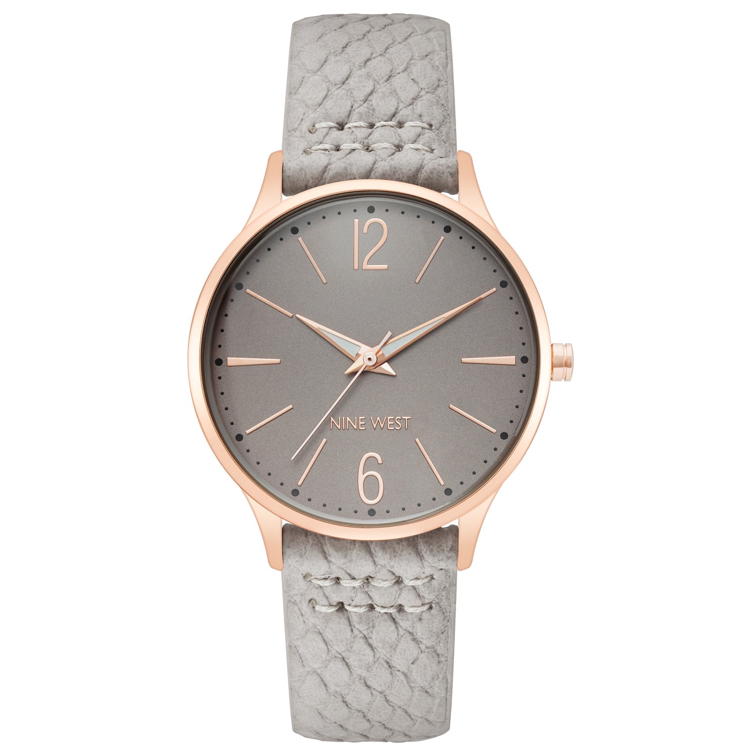 Nine West Damen Analog Quarzuhr mit silberfarbenem Metallgehäuse und Metallarmband, rosa Zifferblatt