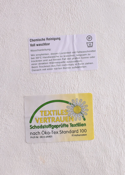 Neuseeland Schaffell 90 cm   Naturweiß mit dunklen Spitzen