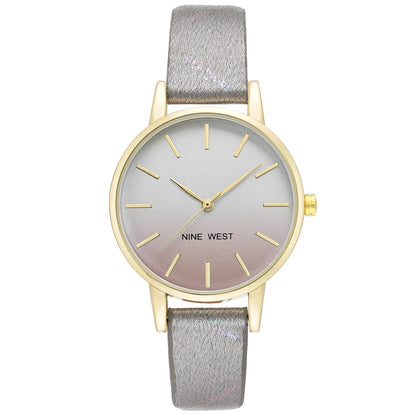 Nine West Damen Analog Quarzuhr mit goldfarbenem Metallgehäuse und Metallarmband, blaues Zifferblatt