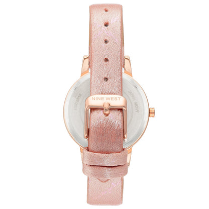 Nine West Damen Analog Quarzuhr mit roséfarbenem Metallgehäuse und Metallarmband, rosa Zifferblatt