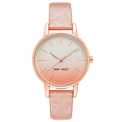 Nine West Damen Analog Quarzuhr mit goldfarbenem Metallgehäuse und Metallarmband, graues Zifferblatt