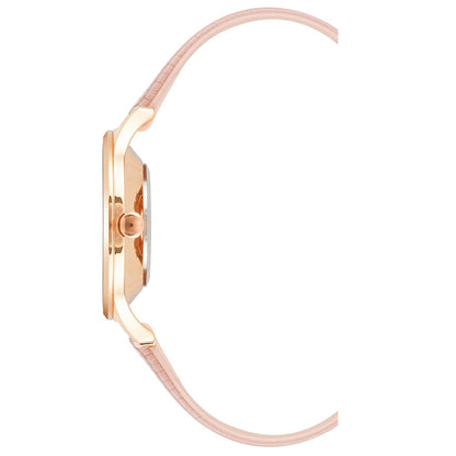 Nine West Damen Analog Quarzuhr mit roséfarbenem Metallgehäuse und Metallarmband, rosa Zifferblatt
