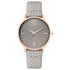 Nine West Damen Analog Quarzuhr mit silberfarbenem Metallgehäuse und Metallarmband, rosa Zifferblatt