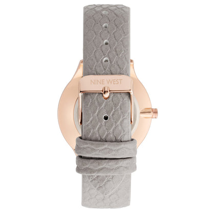 Nine West Damen Analog Quarzuhr mit roséfarbenem Metallgehäuse und Metallarmband, graues Zifferblatt