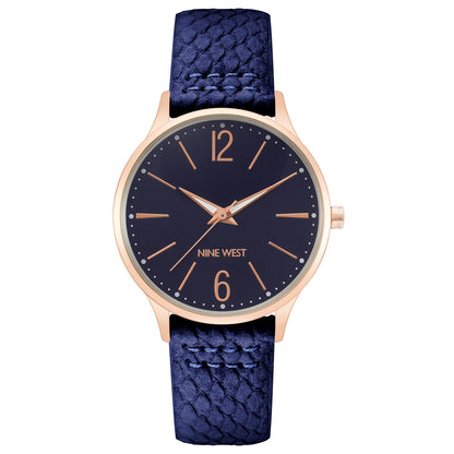 Nine West Damen Analog Quarzuhr mit roséfarbenem Metallgehäuse und Metallarmband, dunkelblaues Zifferblatt