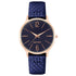 Nine West Damen Analog Quarzuhr mit roséfarbenem Metallgehäuse und Metallarmband, dunkelblaues Zifferblatt