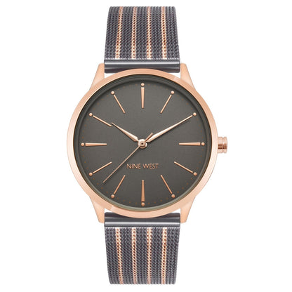 Nine West Damen Analog Quarzuhr mit roséfarbenem Metallgehäuse und Metallarmband, rosa Zifferblatt