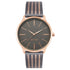 Nine West Damen Analog Quarzuhr mit roséfarbenem Metallgehäuse und Metallarmband, rosa Zifferblatt