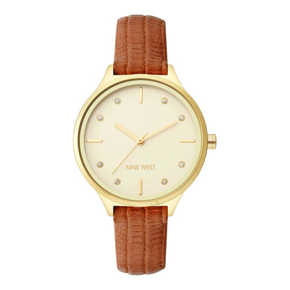 Nine West Damen Analog Quarzuhr mit roséfarbenem Metallgehäuse und Metallarmband, blaues Zifferblatt