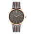 Nine West Damen Analog Quarzuhr mit roséfarbenem Metallgehäuse und Metallarmband, rosa Zifferblatt