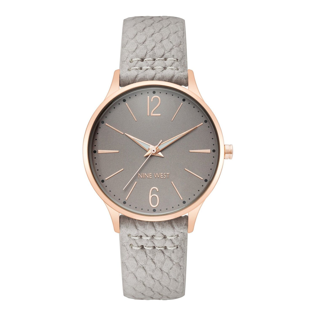 Nine West Damen Analog Quarzuhr mit silberfarbenem Metallgehäuse und Metallarmband, rosa Zifferblatt